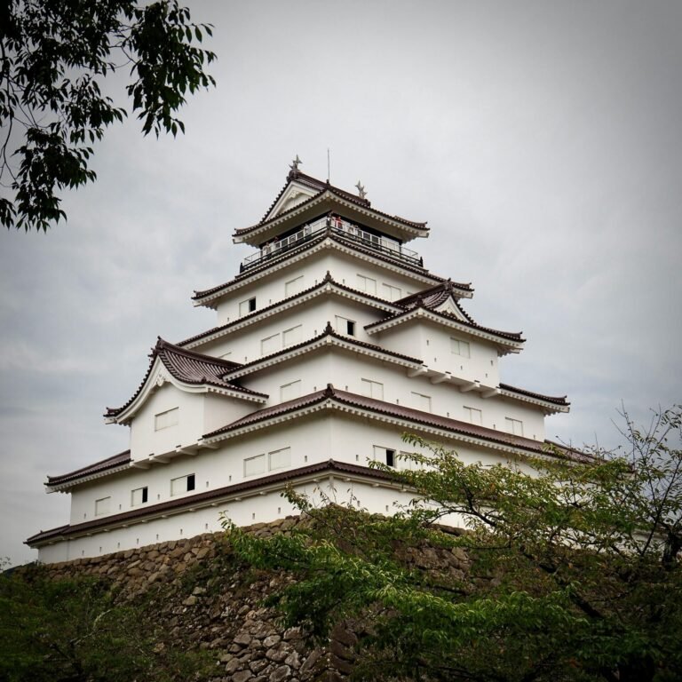 Majestic view of Tsurugajo Castle, a traditional Japanese landmark in Aizuwakamatsu.